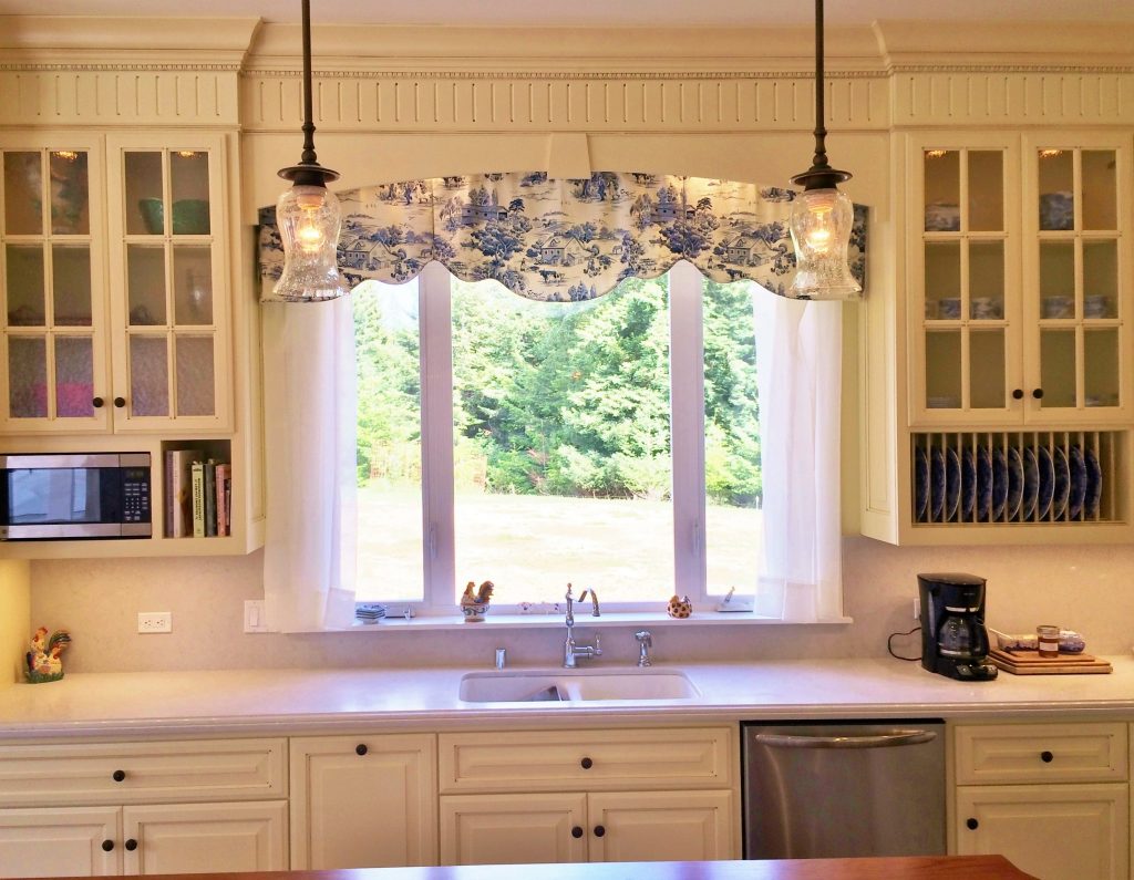 Shaped and pleated Hidden Rod Pocket valance for a kitchen window. 