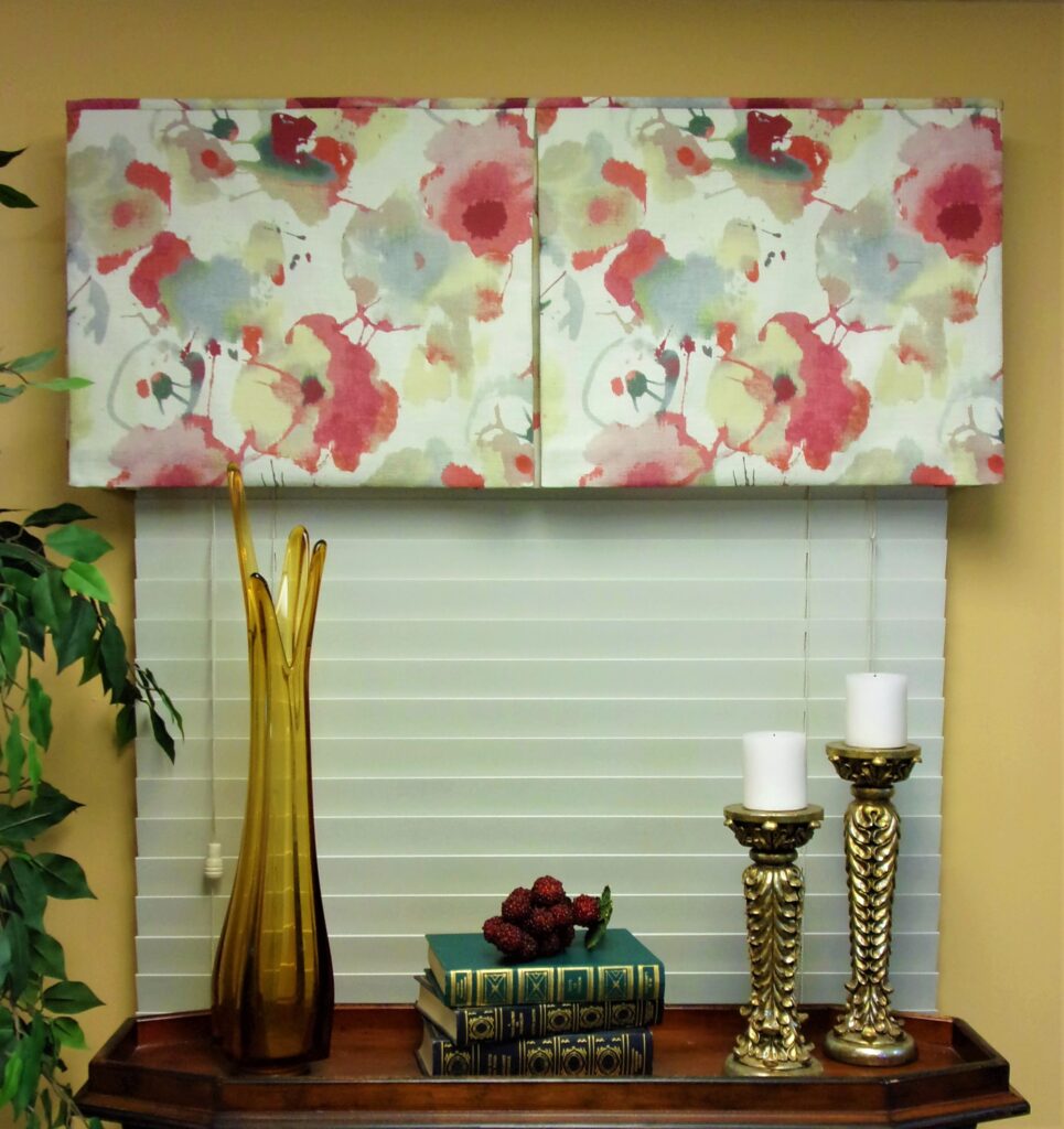 Workroom sample of BOX PLEATED Hidden Rod Pocket valance, created using red, ivory and gray fabric